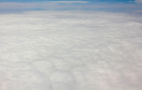 Airplane-Window-View-Puffy-Clouds-By-Jonathan-Green